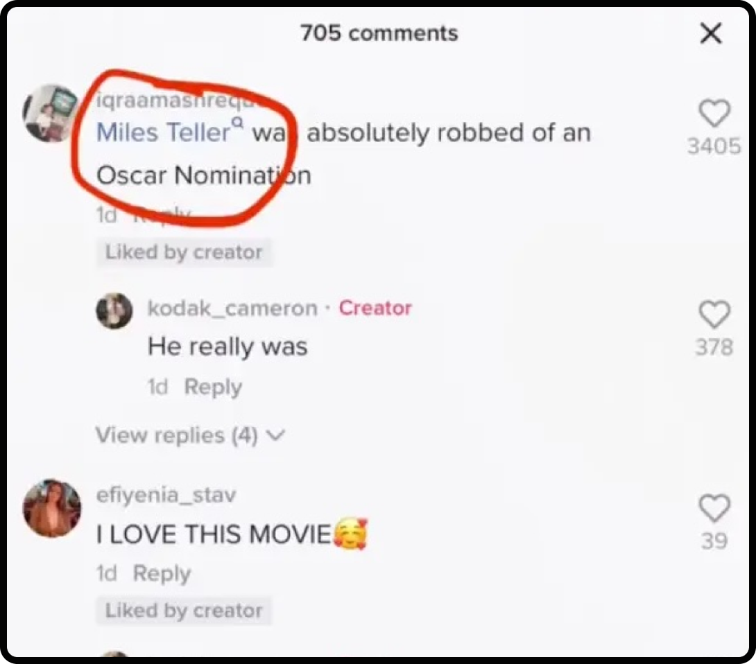 Comment section of a TikTok with a suggested search in the comment content.