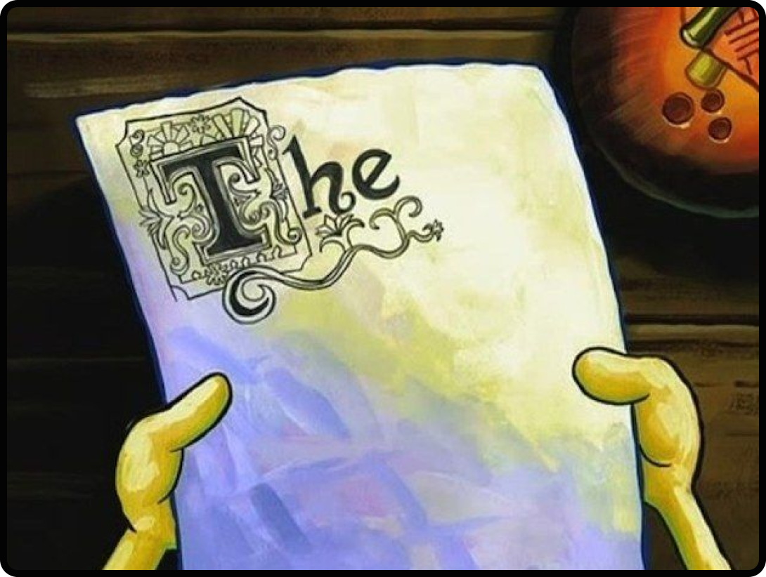 Spongebob holding a piece of paper with "The" written on it.