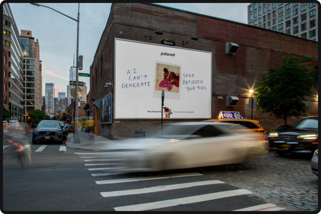 Anti-AI marketing campaign from Polaroid in the form of a billboard.