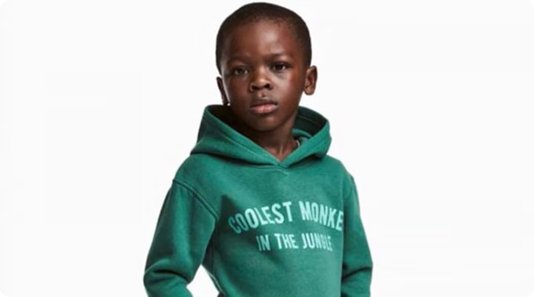 H&M ad with a little boy wearing a "Coolest monkey in the jungle" sweatshirt, an example of controversial advertising.